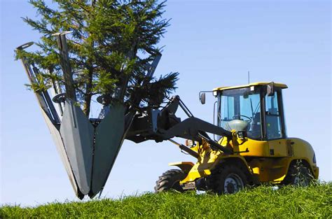 Tree Spade for skid steer in action 